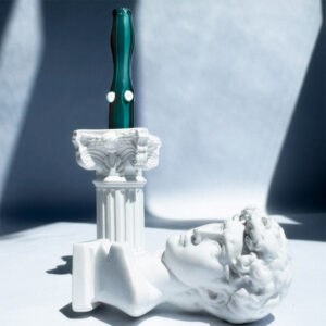 Our teal joint holder cools your smoke and makes every sesh fancy