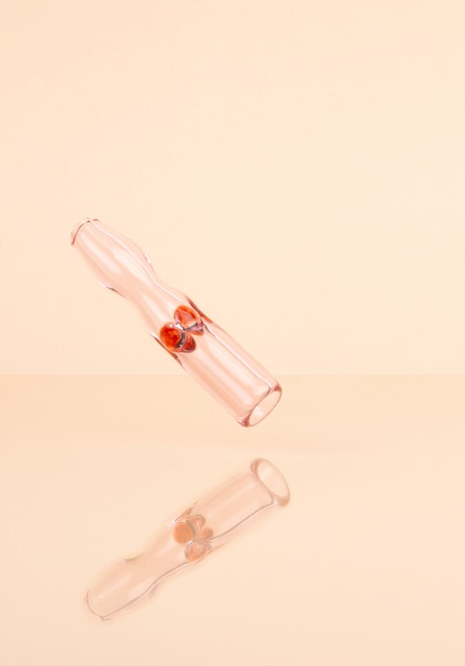 Our pink joint holder cools your smoke and makes every sesh feel fancy