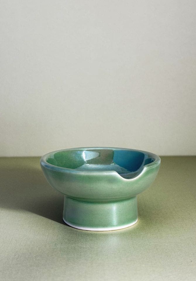 You can use our iridescent green ceramic ashtray as a serving bowl, too