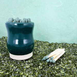 Our sculptural green matchstick holder turns lighting up into an artful ritual