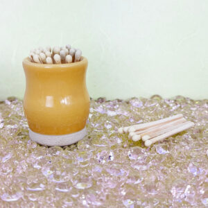 Our yellow pipe and matchstick holder are the keys to a stylish light