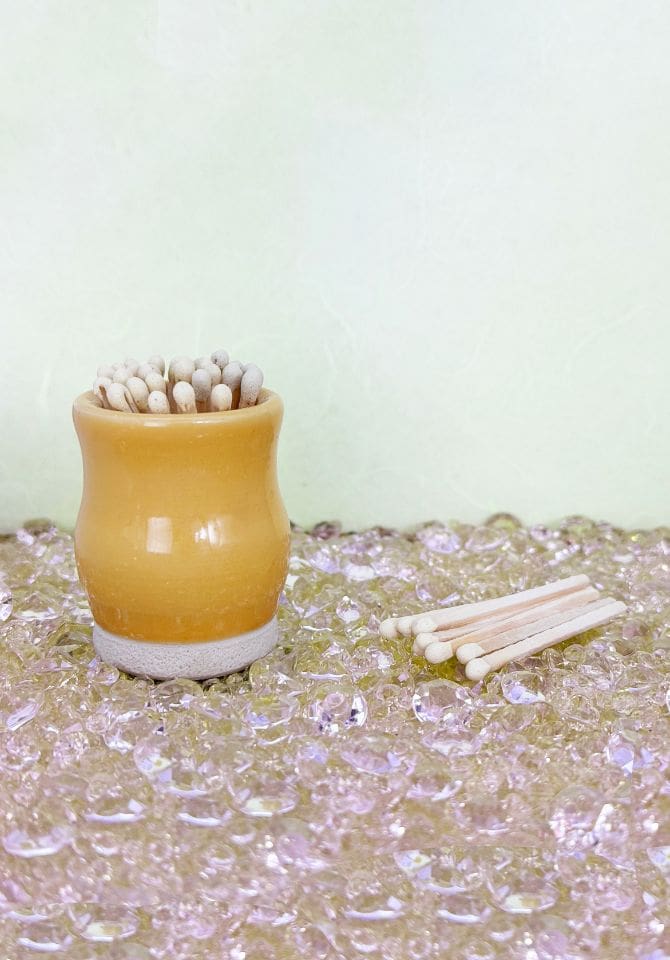 Our yellow match striker includes yellow-tipped safety matches