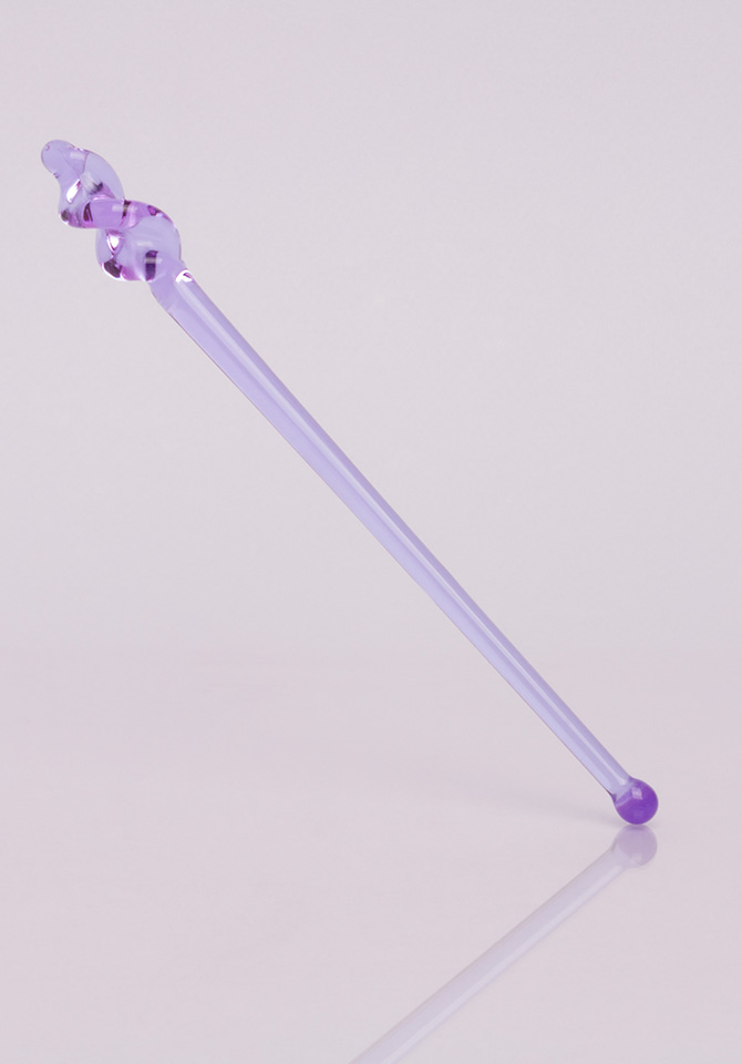 Our purple tamping stick does double duty as a tamper and a swizzle