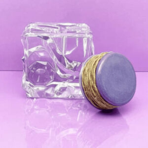 Our purple hemp wick holder is stylish and keeps your wick neat