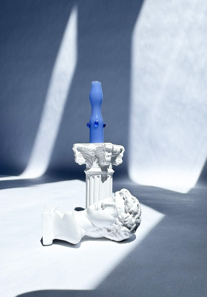 Our blue joint holder is handblown by an artist in California