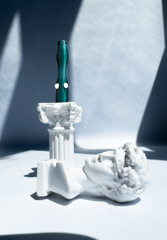 Our teal joint holder cools your smoke and makes every sesh fancy