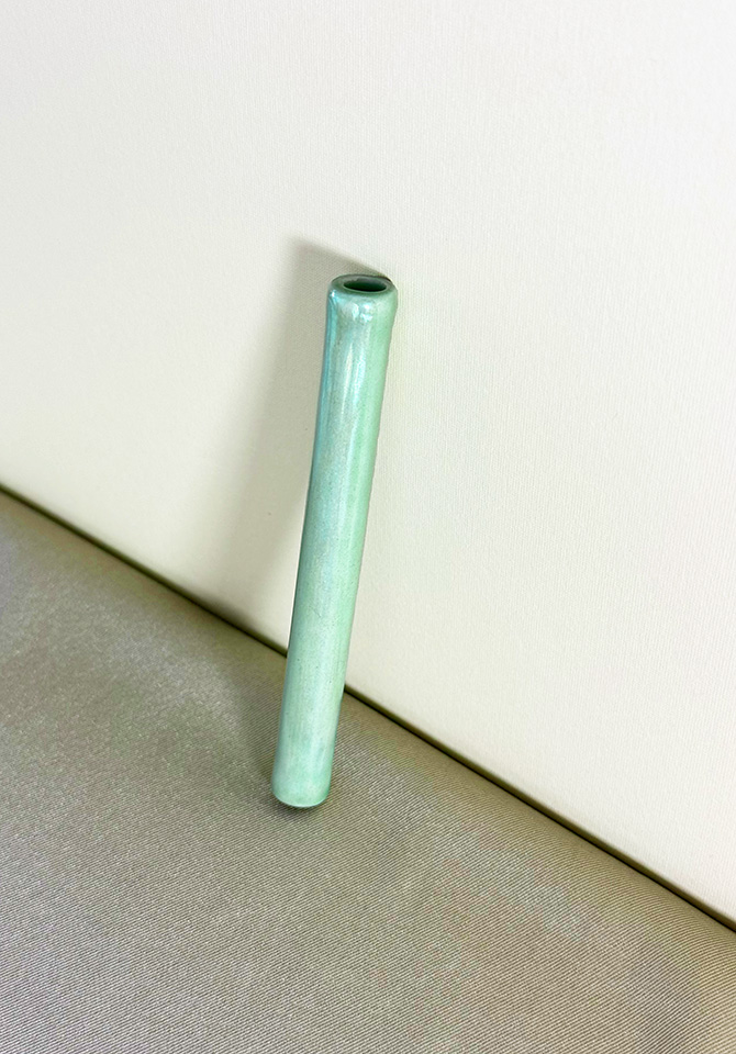 The length of our iridescent green one hitter cools your smoke before it hits your throat