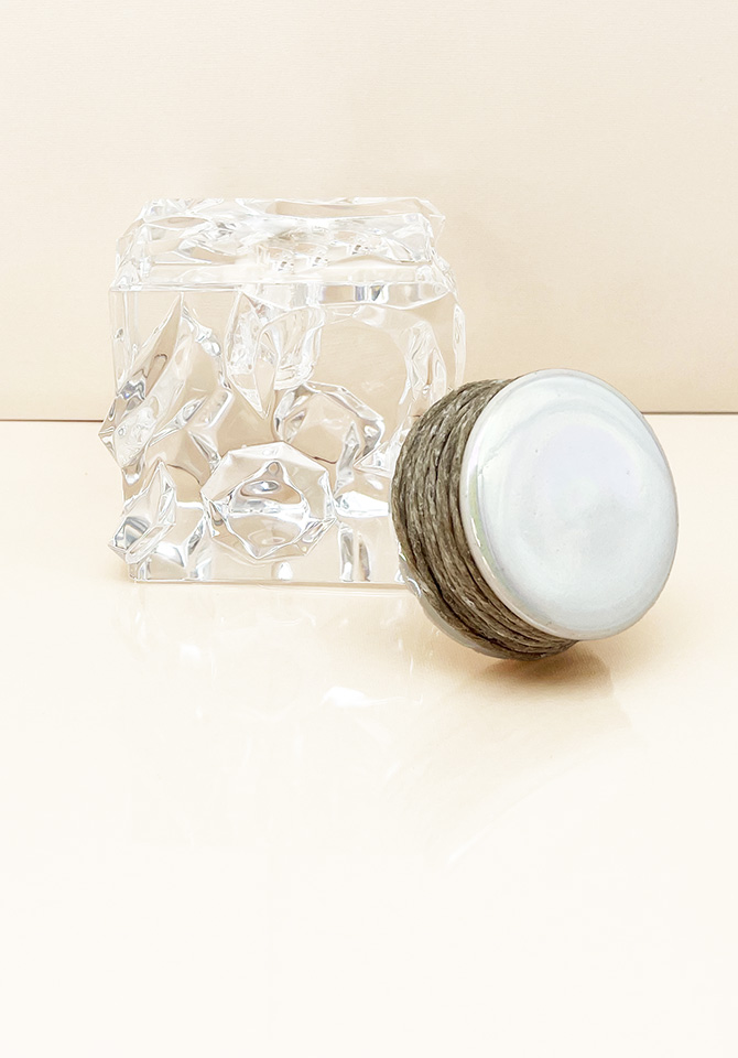 Go natural and stay stylish with our white hemp wick holder