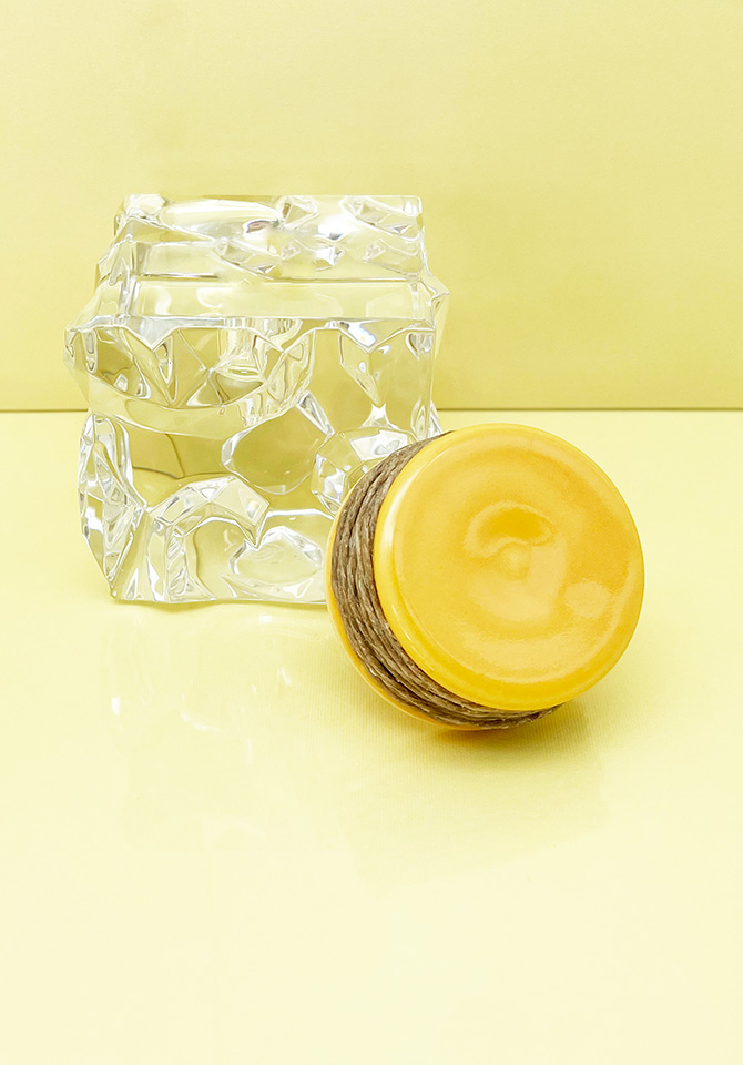 Go natural and stay stylish with our yellow hemp wick holder